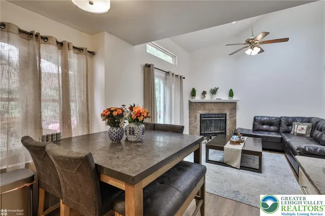 a view of a livingroom with furniture and a fireplace