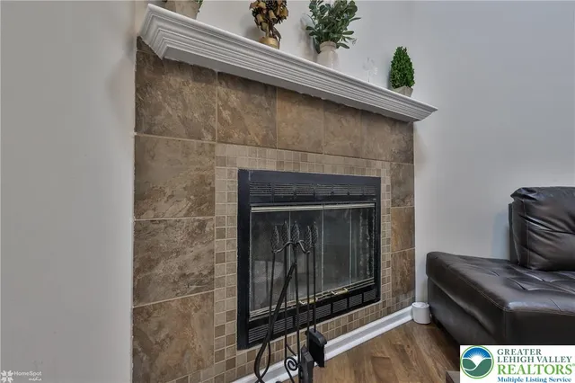 a living room with a fireplace