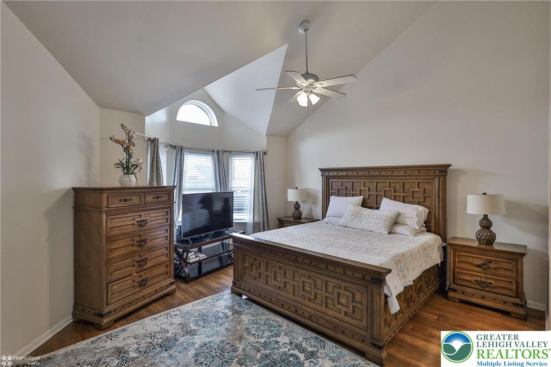 204 Ridings Circle Macungie, PA 18062 - Photo 31 of 53 a bedroom with a bed and a chandelier