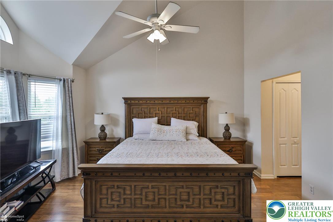 204 Ridings Circle Macungie, PA 18062 - Photo 34 of 53 a bedroom with a bed and a flat tv screen on dresser