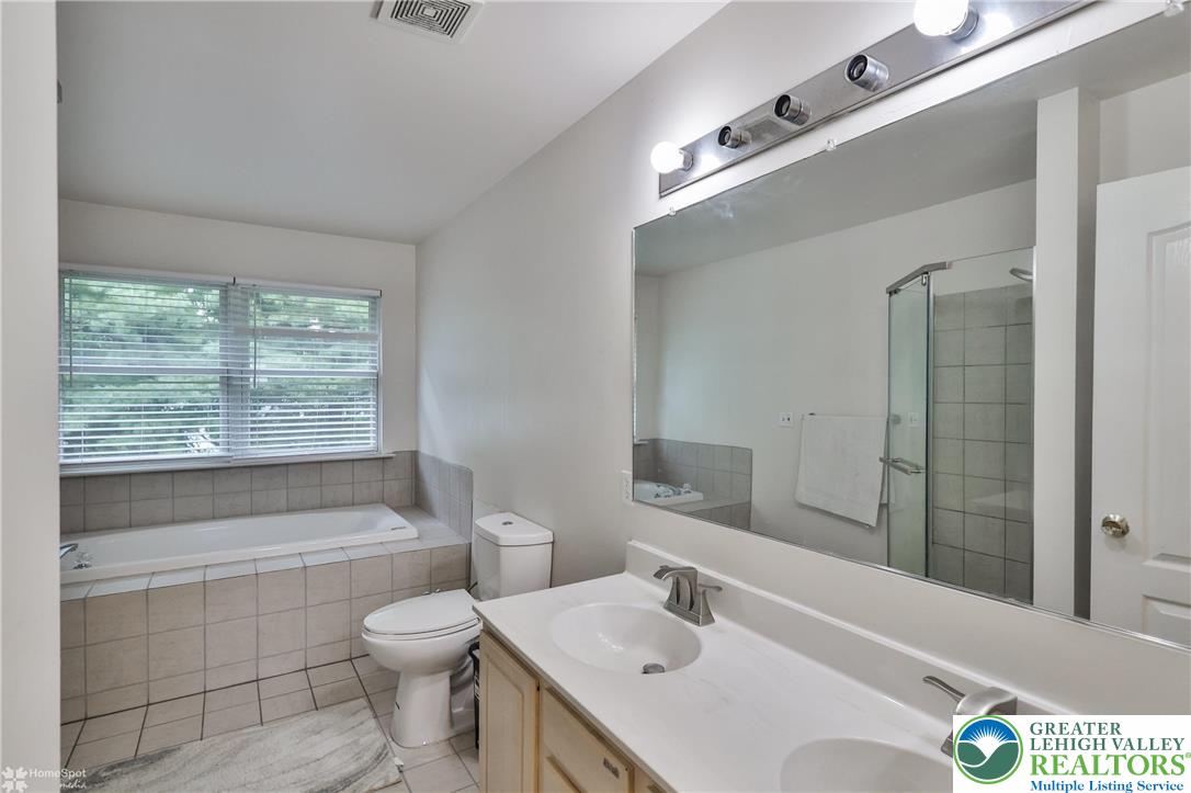 204 Ridings Circle Macungie, PA 18062 - Photo 35 of 53 a bathroom with a sink toilet and shower