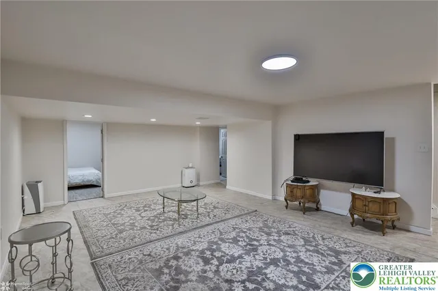 a bedroom with a bed and a cabinets