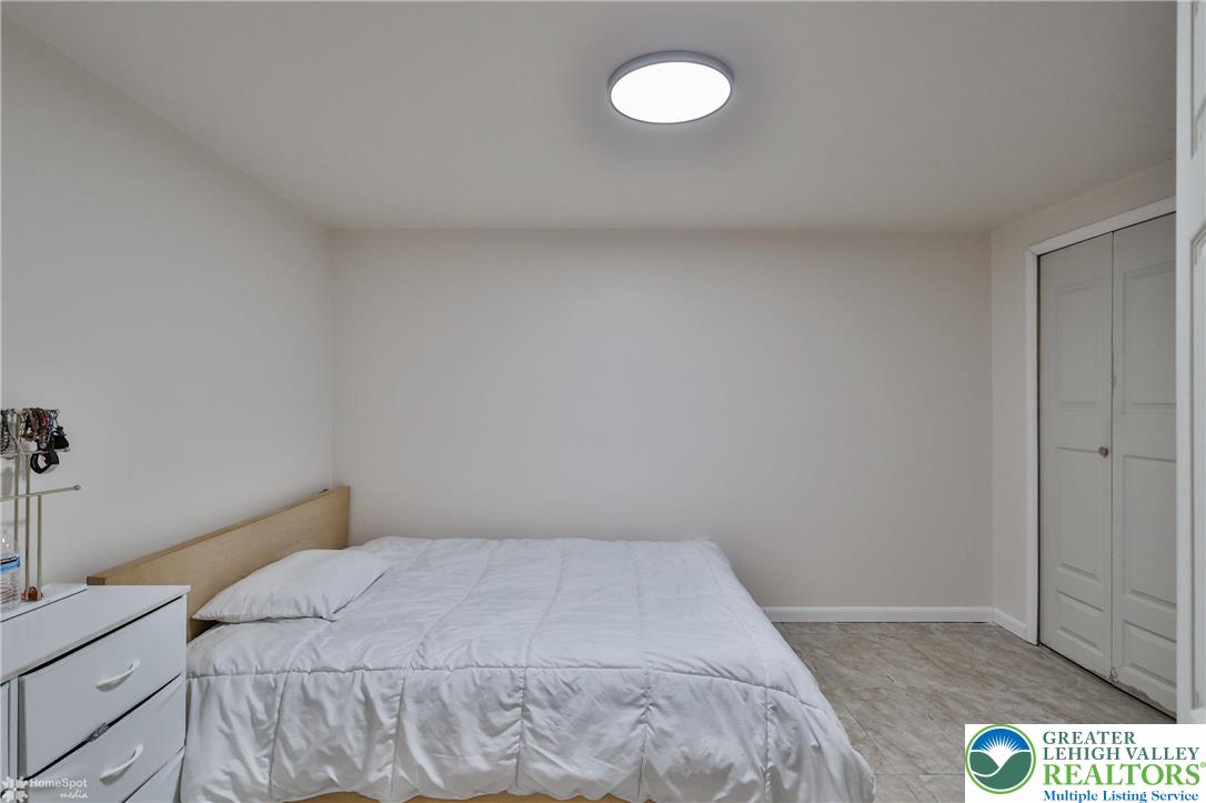 204 Ridings Circle Macungie, PA 18062 - Photo 45 of 53 a bedroom with a bed and a cabinets