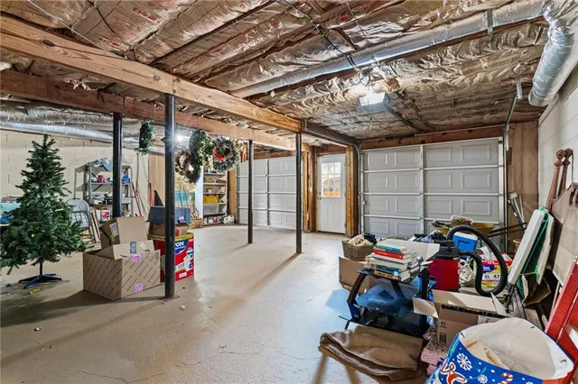 a view of backyard with a balcony and wooden floor