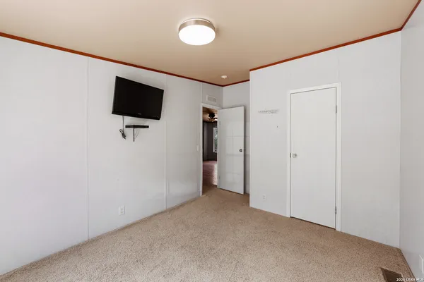 a view of a livingroom with a flat screen tv
