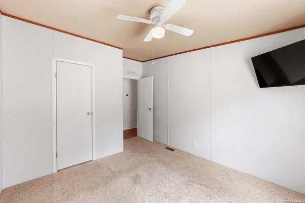 a view of a livingroom with a flat screen tv