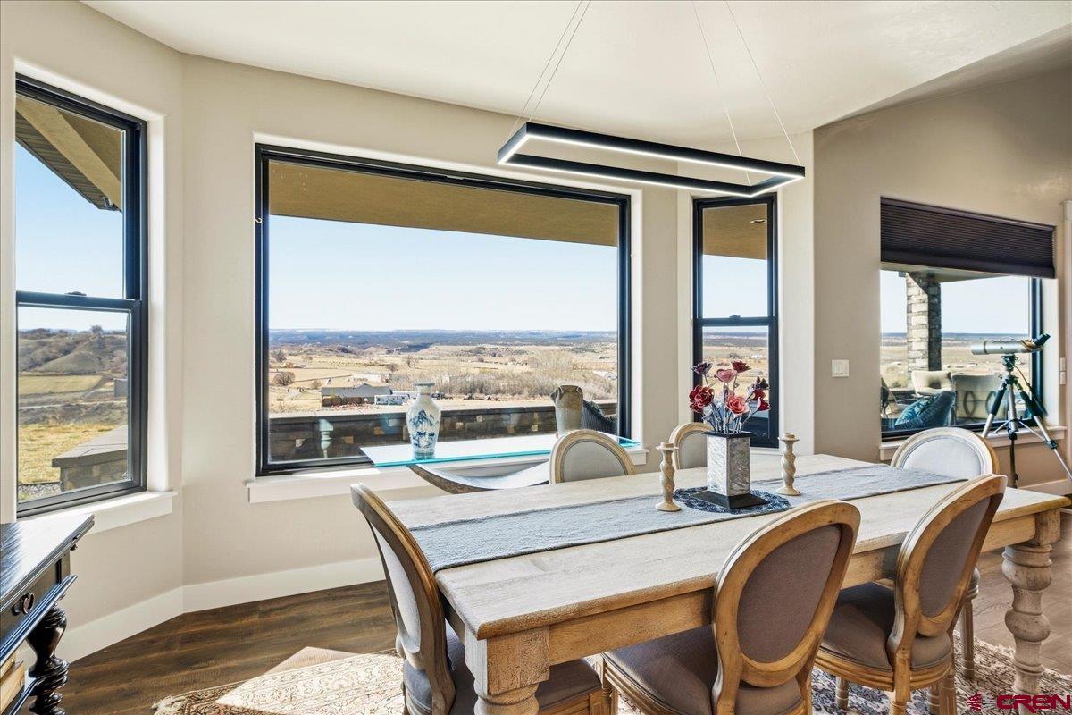 11266 5880 Road Montrose, CO 81403 - Photo 20 of 43 a living room with furniture and a large window