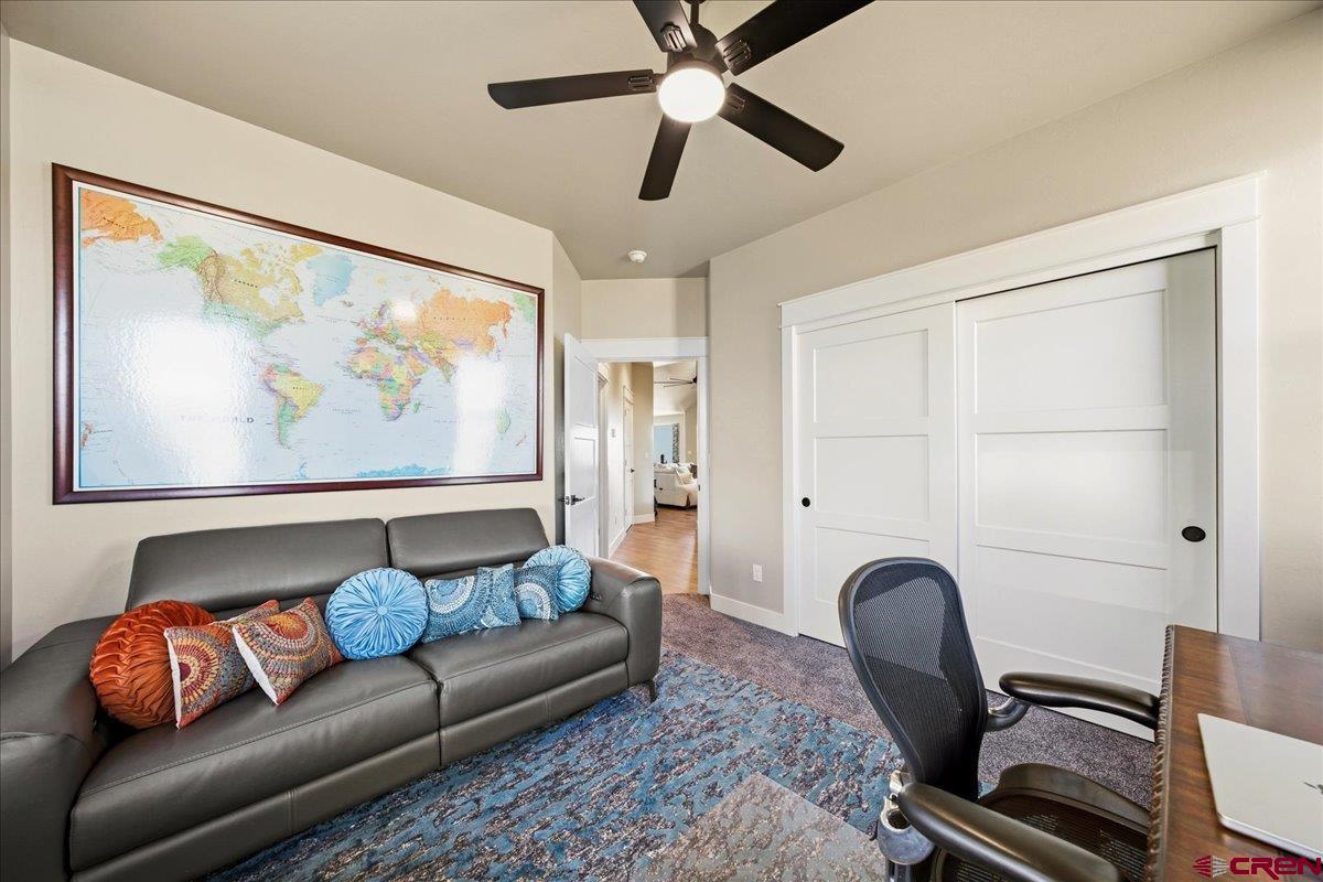 11266 5880 Road Montrose, CO 81403 - Photo 23 of 43 a living room with furniture
