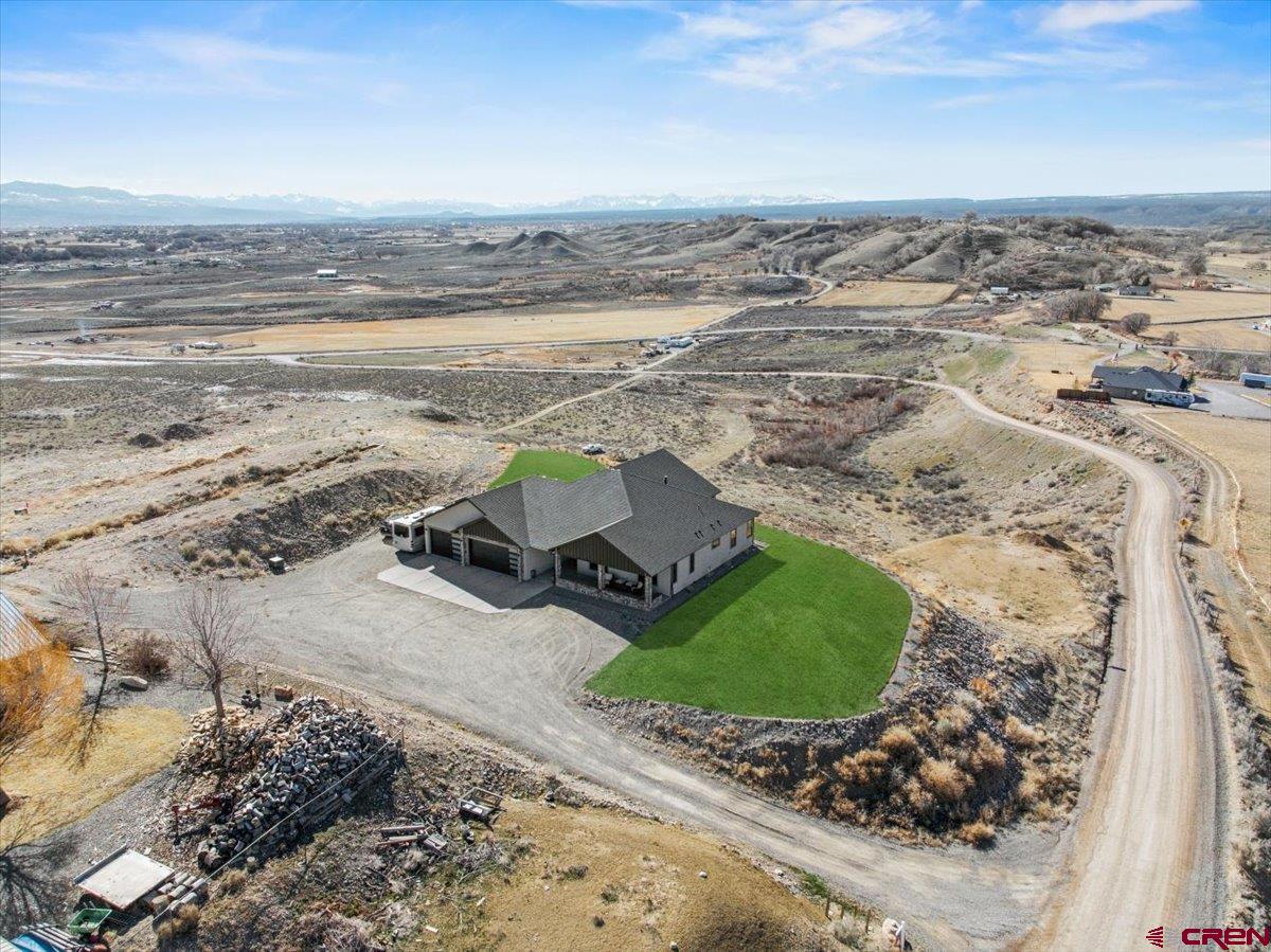 11266 5880 Road Montrose, CO 81403 - Photo 3 of 43 a view of a lake with beach and ocean view