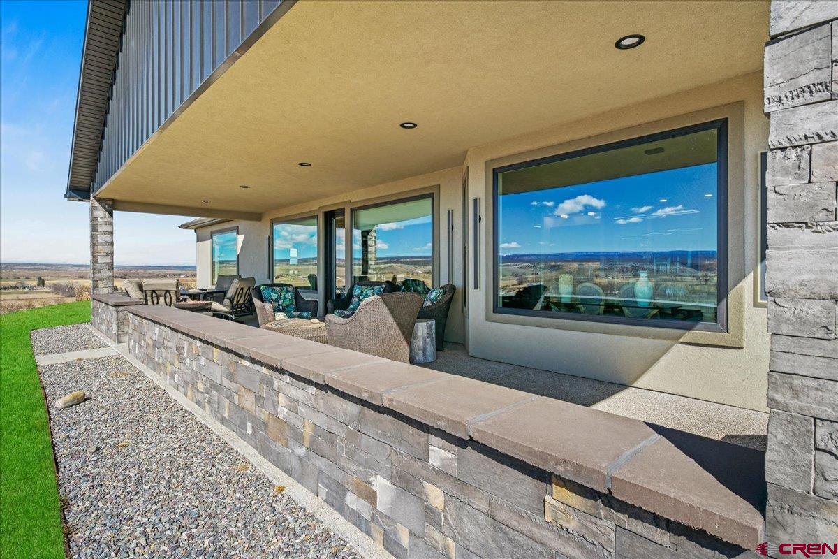 11266 5880 Road Montrose, CO 81403 - Photo 7 of 43 a view of a living room with a large window