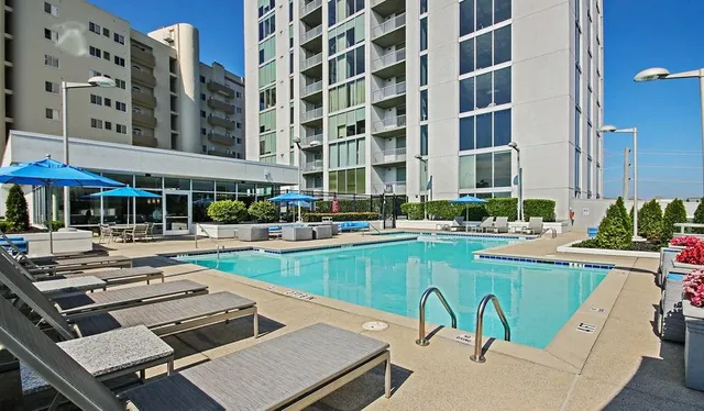 a view of a swimming pool with a patio