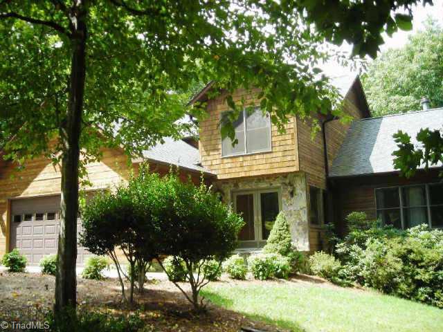 4910 Gold Crest Drive Oak Ridge, NC 27310 - Photo 1 of 9 Exterior Front.