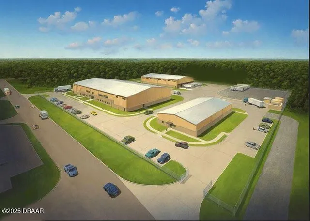 an aerial view of house with yard