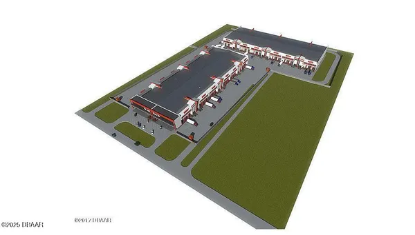 an aerial view of house with yard