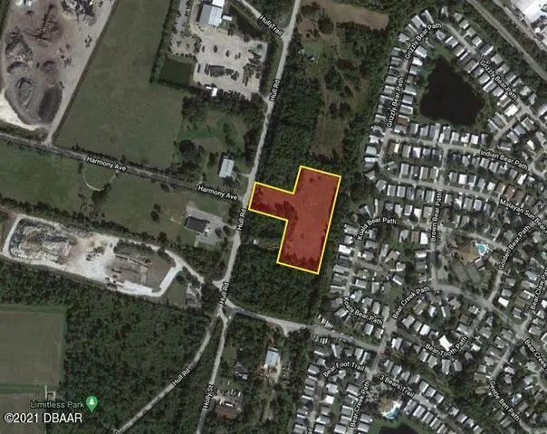 an aerial view of houses with yard