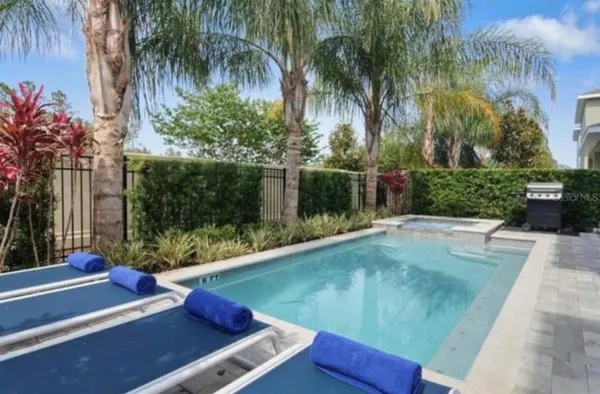a view of a backyard of a house