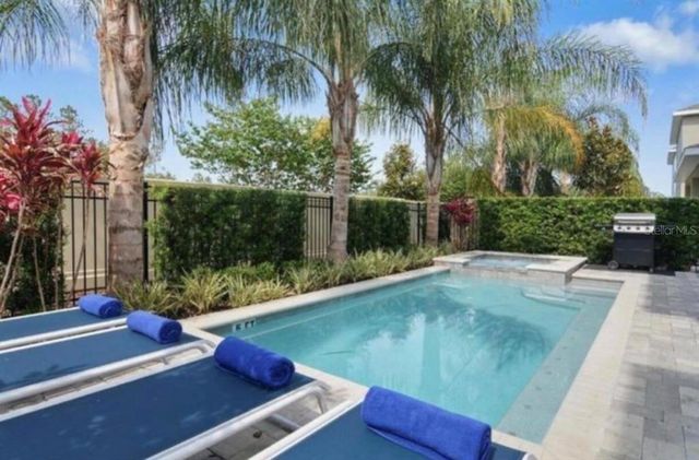 a view of a backyard of a house