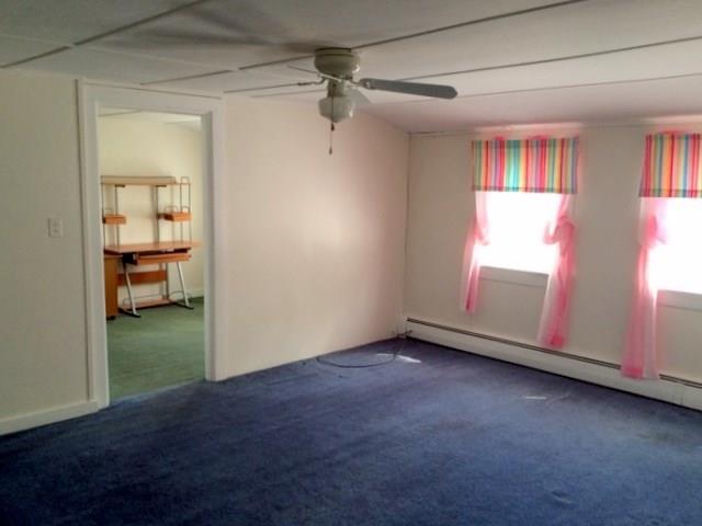 24 Cushman Road Winslow, ME 04901 - Photo 22 of 25 Bedroom 2 looking out into the bonus...
