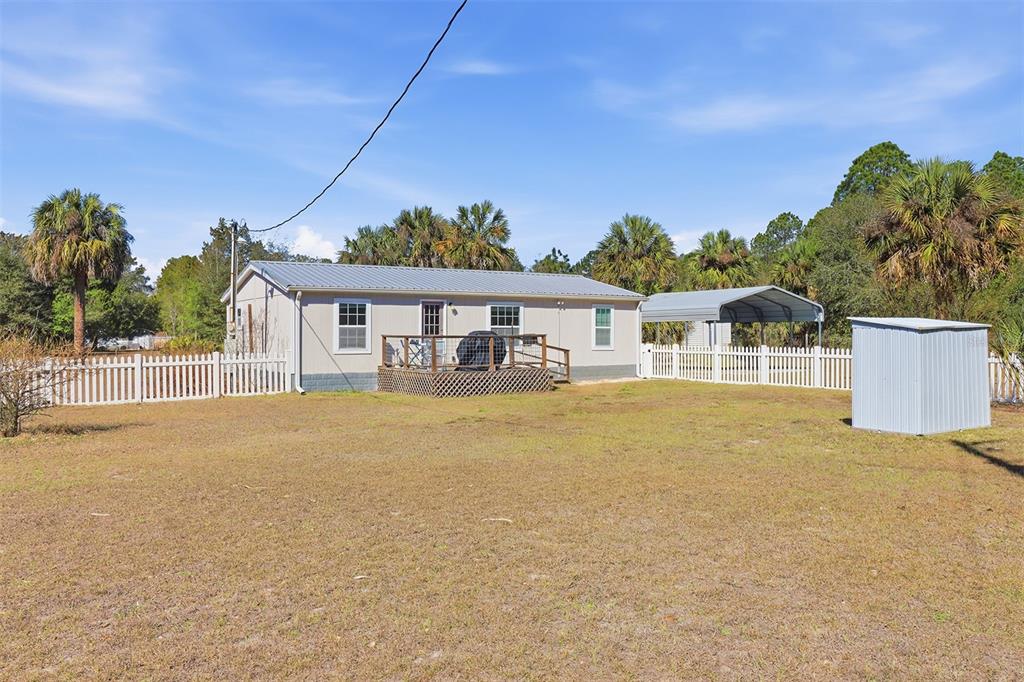 9510 North Eventide Point Crystal River, FL 34428 - Photo 1 of 45 a front view of a house with a swimming pool