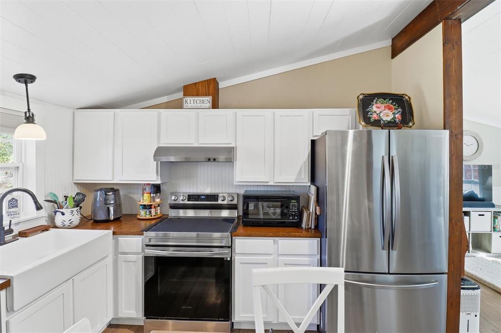 9510 North Eventide Point Crystal River, FL 34428 - Photo 29 of 45 a kitchen with a refrigerator sink and stove