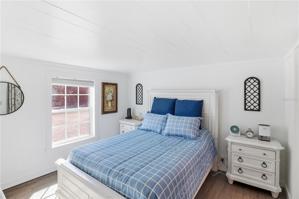 9510 North Eventide Point Crystal River, FL 34428 - Photo 30 of 45 a bedroom with a bed and a window