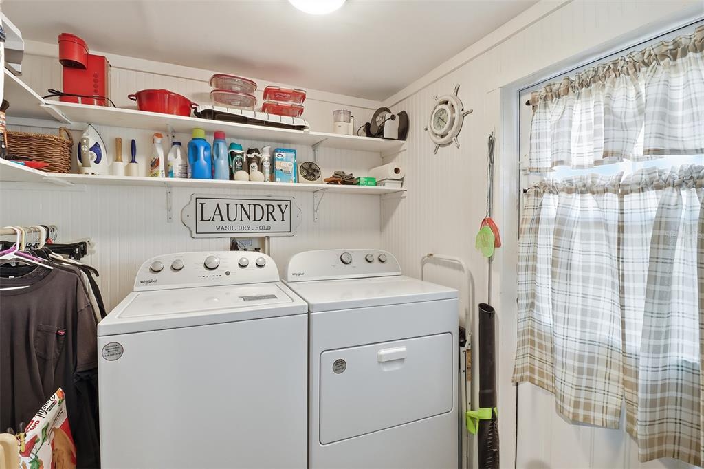 9510 North Eventide Point Crystal River, FL 34428 - Photo 42 of 45 a utility room with dryer and washer