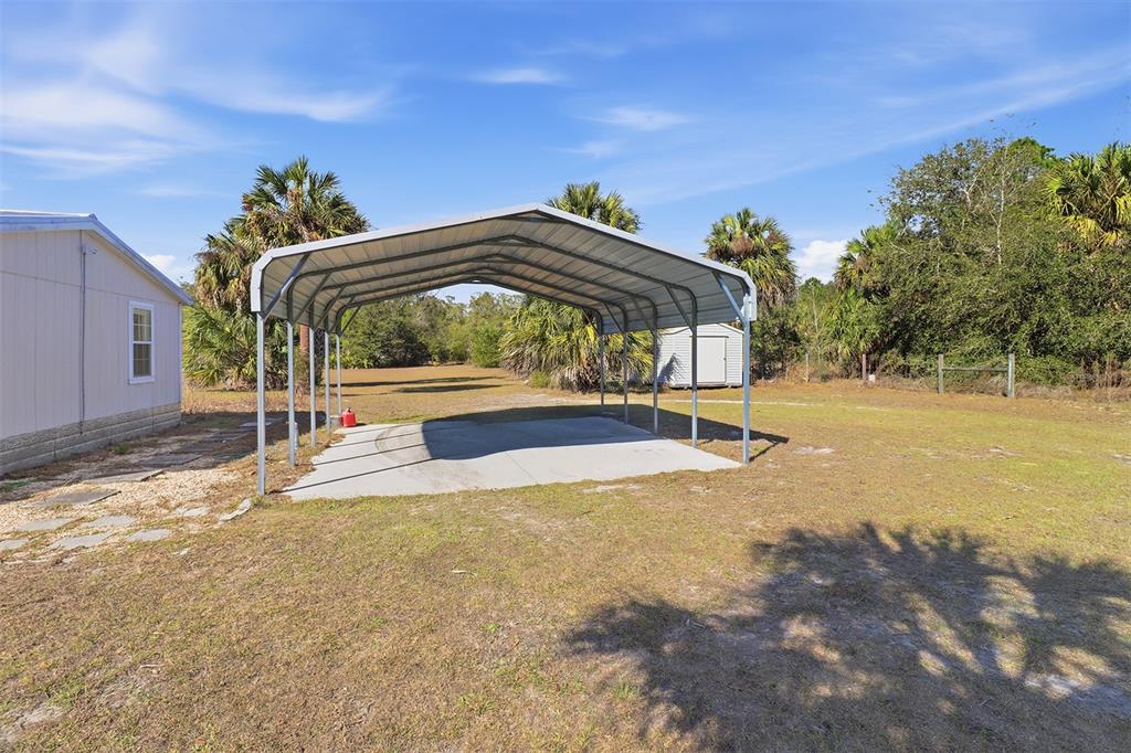 9510 North Eventide Point Crystal River, FL 34428 - Photo 6 of 45 a view of a house with basketball court