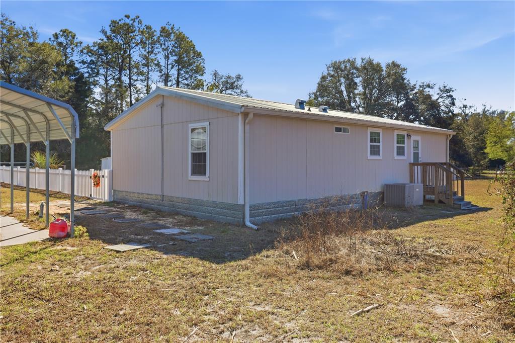 9510 North Eventide Point Crystal River, FL 34428 - Photo 10 of 45 a view of a house with a yard