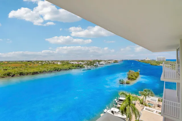 a kitchen with granite countertop cabinets stainless steel appliances a sink and a counter top space