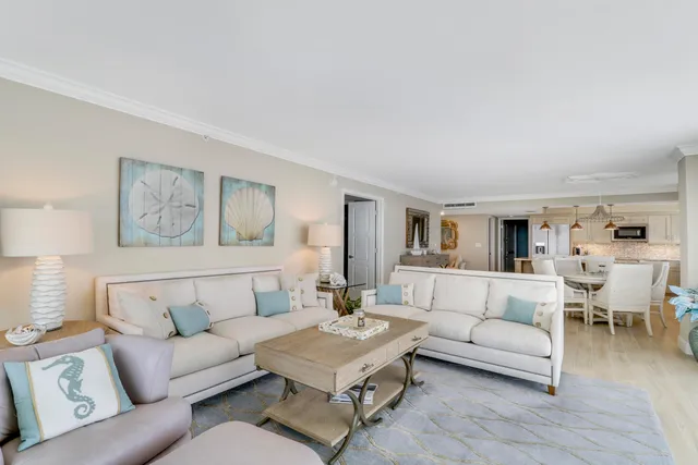 a view of a balcony with an outdoor seating