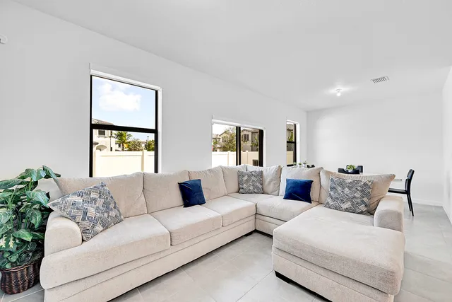 a bedroom with a bed and a cabinets