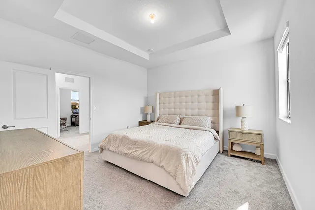 a view of an empty room with windows