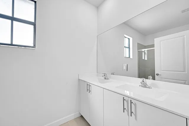 a bathroom with a shower and a toilet