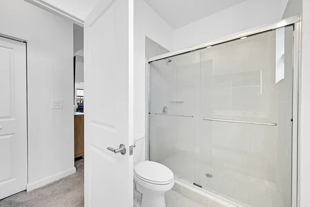 a bedroom with a workspace