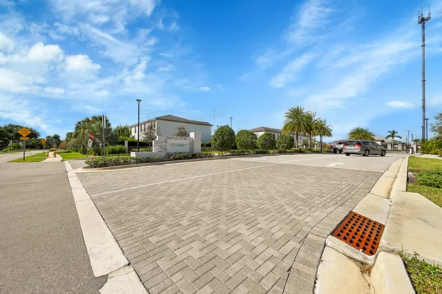 a living room with furniture gym equipment and view of living room