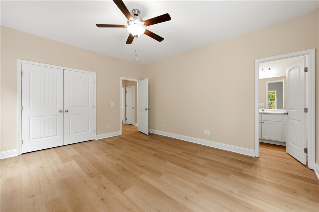 1340 Pelican Lane Southeast Townsend, GA 31331 - Photo 17 of 34 Refreshing lighted ceiling fan and private bath.