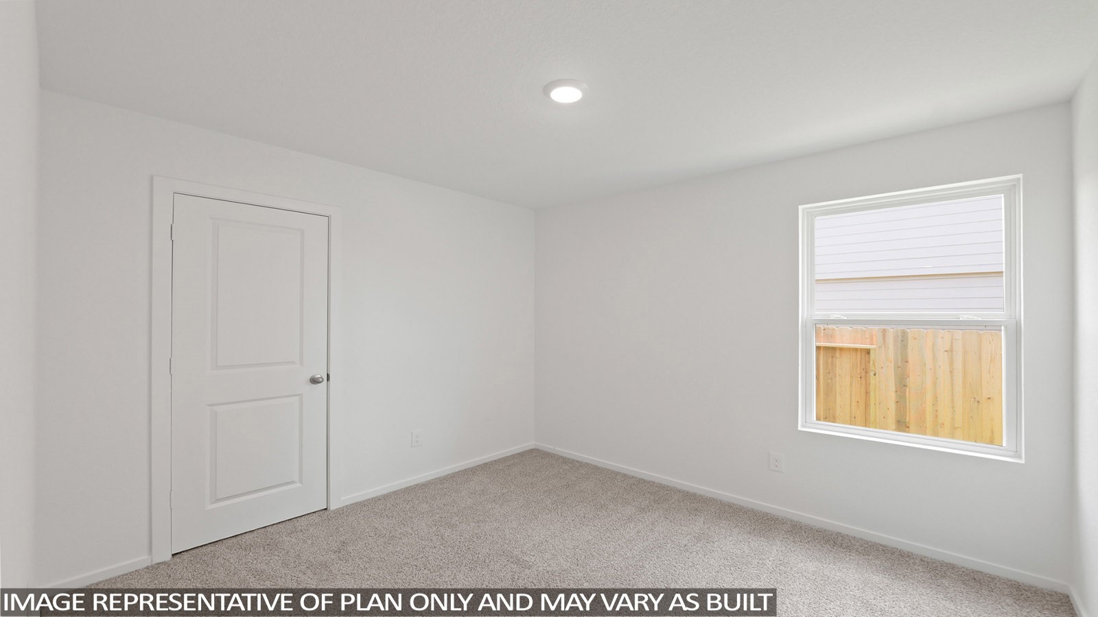 11707 Ruffian Drive Willis, TX 77318 - Photo 13 of 20 an empty room with a window