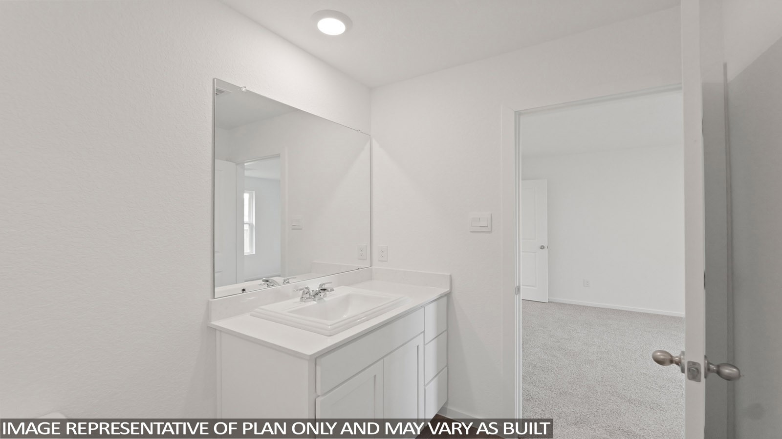 11707 Ruffian Drive Willis, TX 77318 - Photo 9 of 20 a bathroom with a sink and a mirror