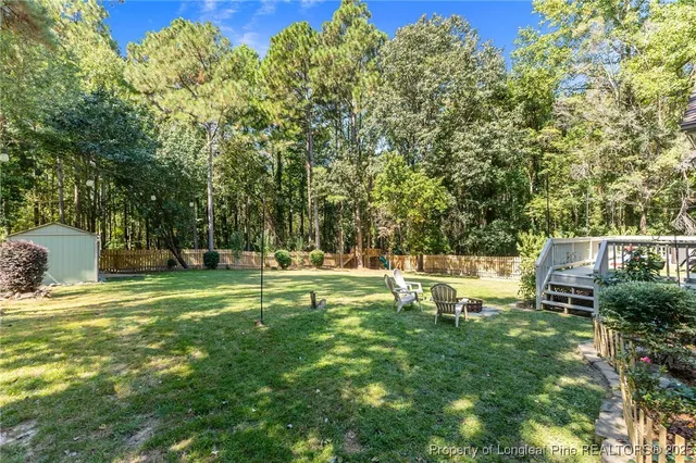 a view of a park with large trees