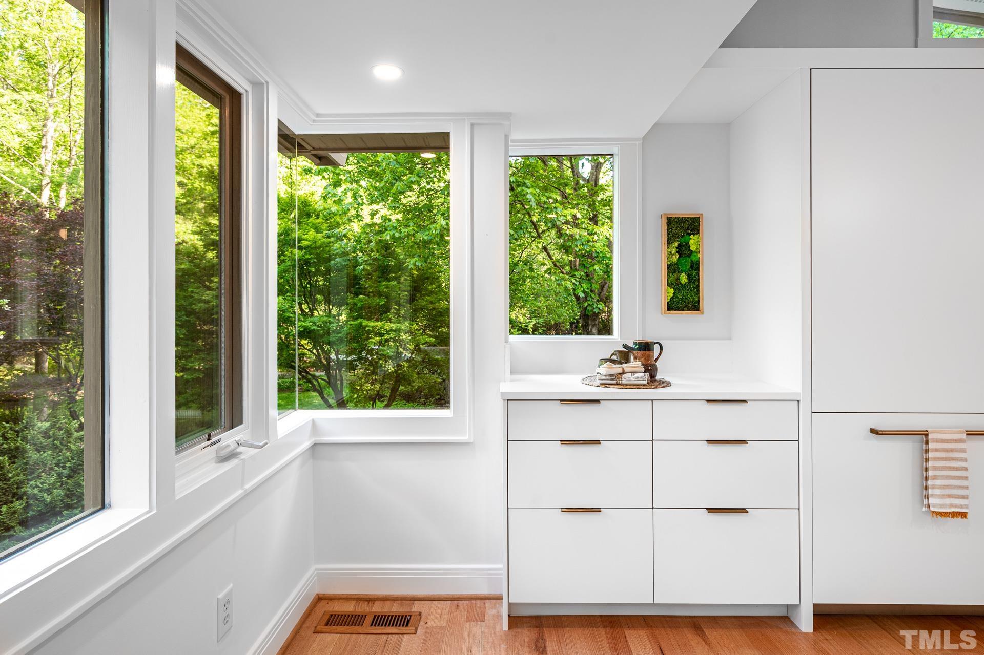 803 Cedar Falls Road Chapel Hill, NC 27514 - Photo 12 of 61 a bathroom with a sink and a large window