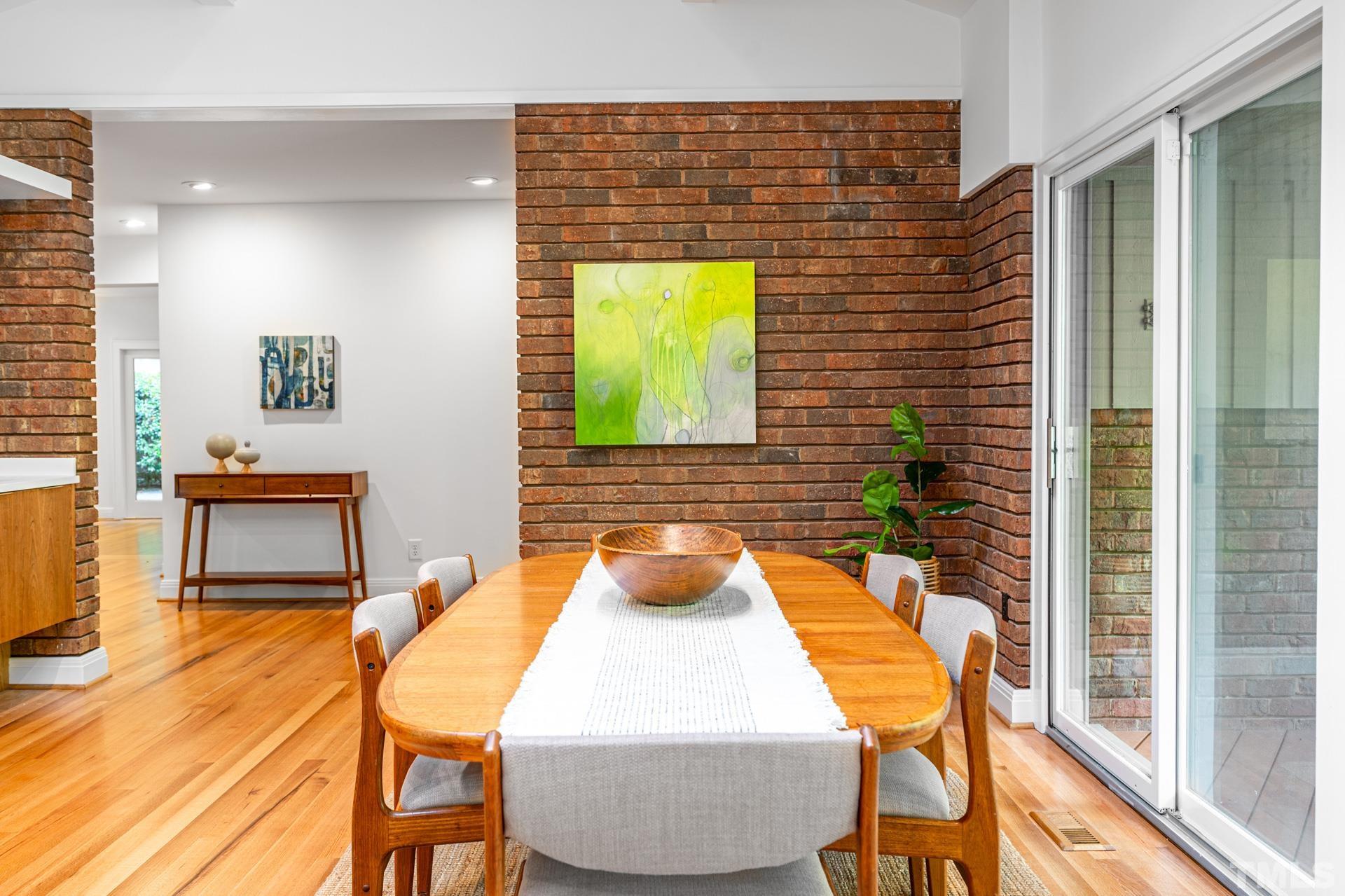 803 Cedar Falls Road Chapel Hill, NC 27514 - Photo 14 of 61 a view of a dining room with furniture and a window