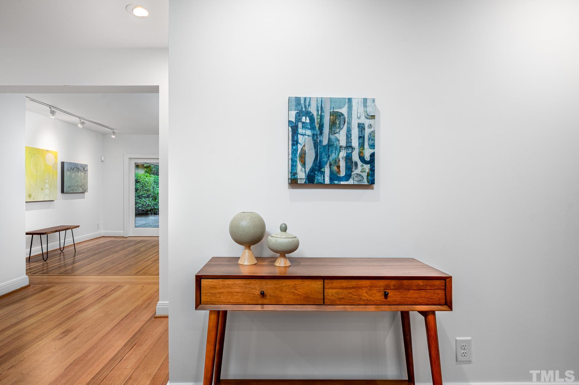 803 Cedar Falls Road Chapel Hill, NC 27514 - Photo 15 of 61 a view of a room with furniture and wooden floor