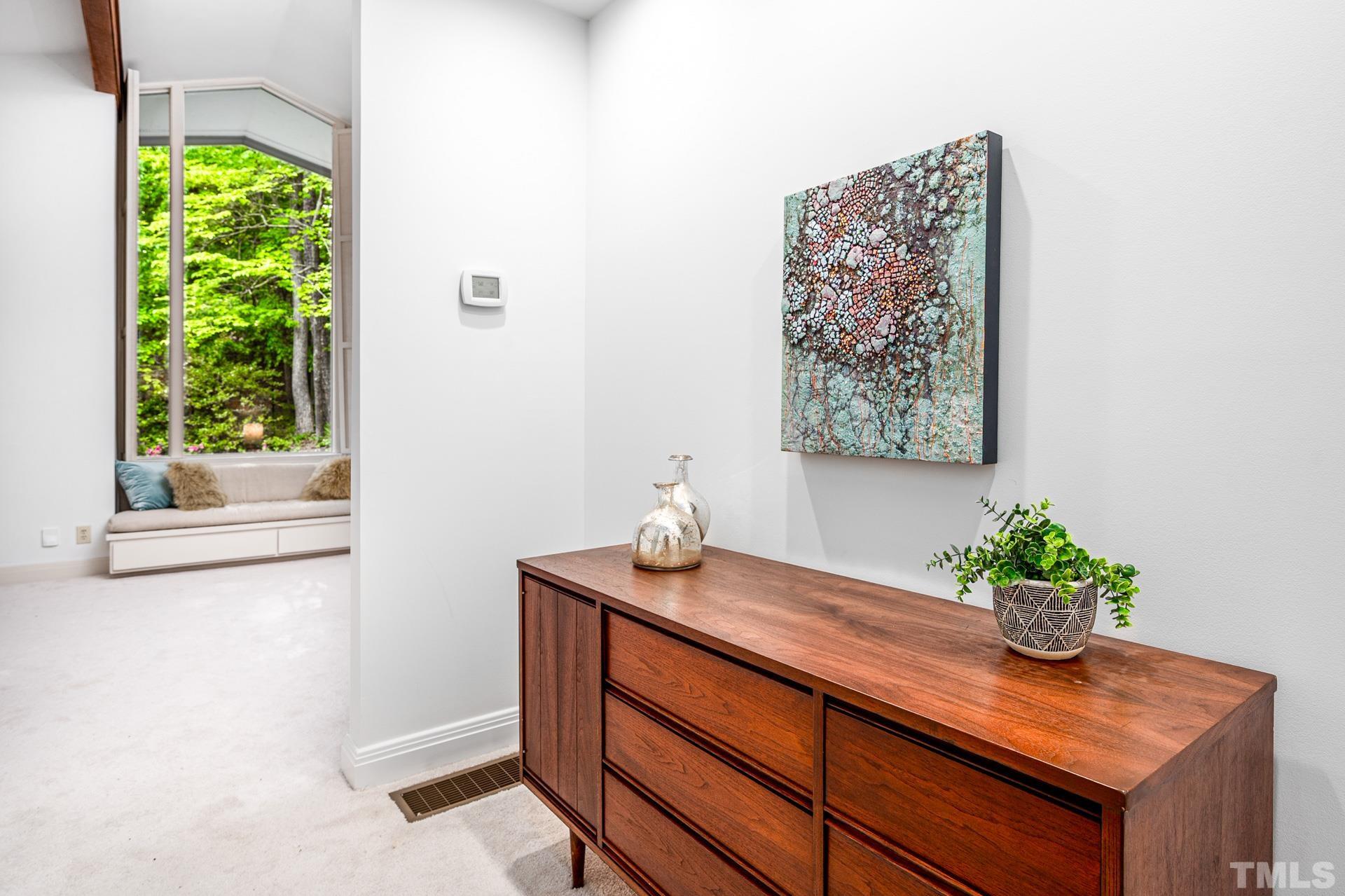 803 Cedar Falls Road Chapel Hill, NC 27514 - Photo 26 of 61 a view of bathroom with a potted plant on a counter and a window