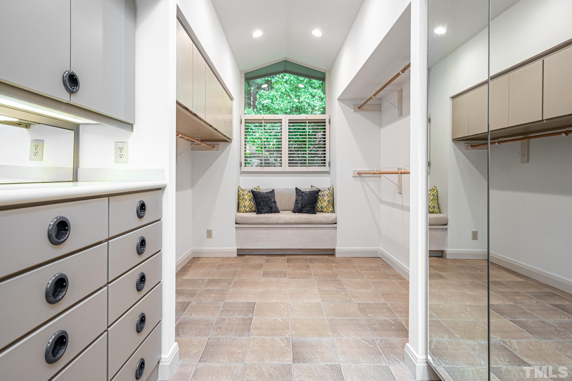 803 Cedar Falls Road Chapel Hill, NC 27514 - Photo 31 of 61 a bathroom with a tub sink and mirror