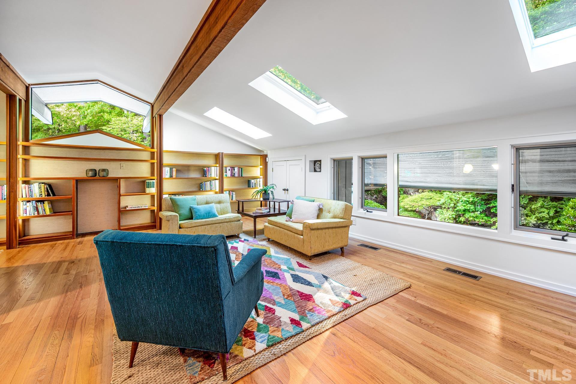 803 Cedar Falls Road Chapel Hill, NC 27514 - Photo 32 of 61 a living room with furniture and a large window