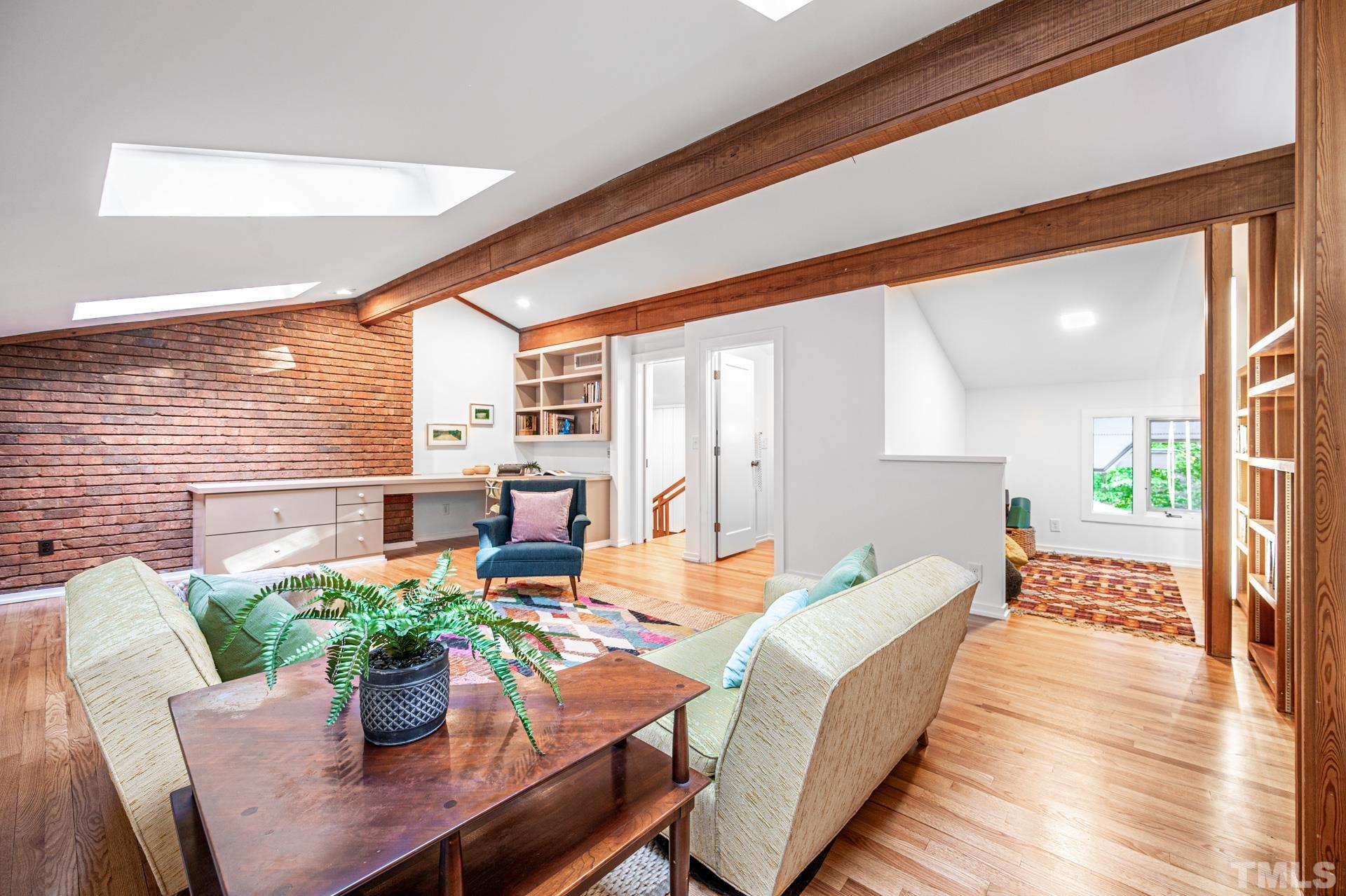 803 Cedar Falls Road Chapel Hill, NC 27514 - Photo 35 of 61 a dining room with furniture and wooden floor