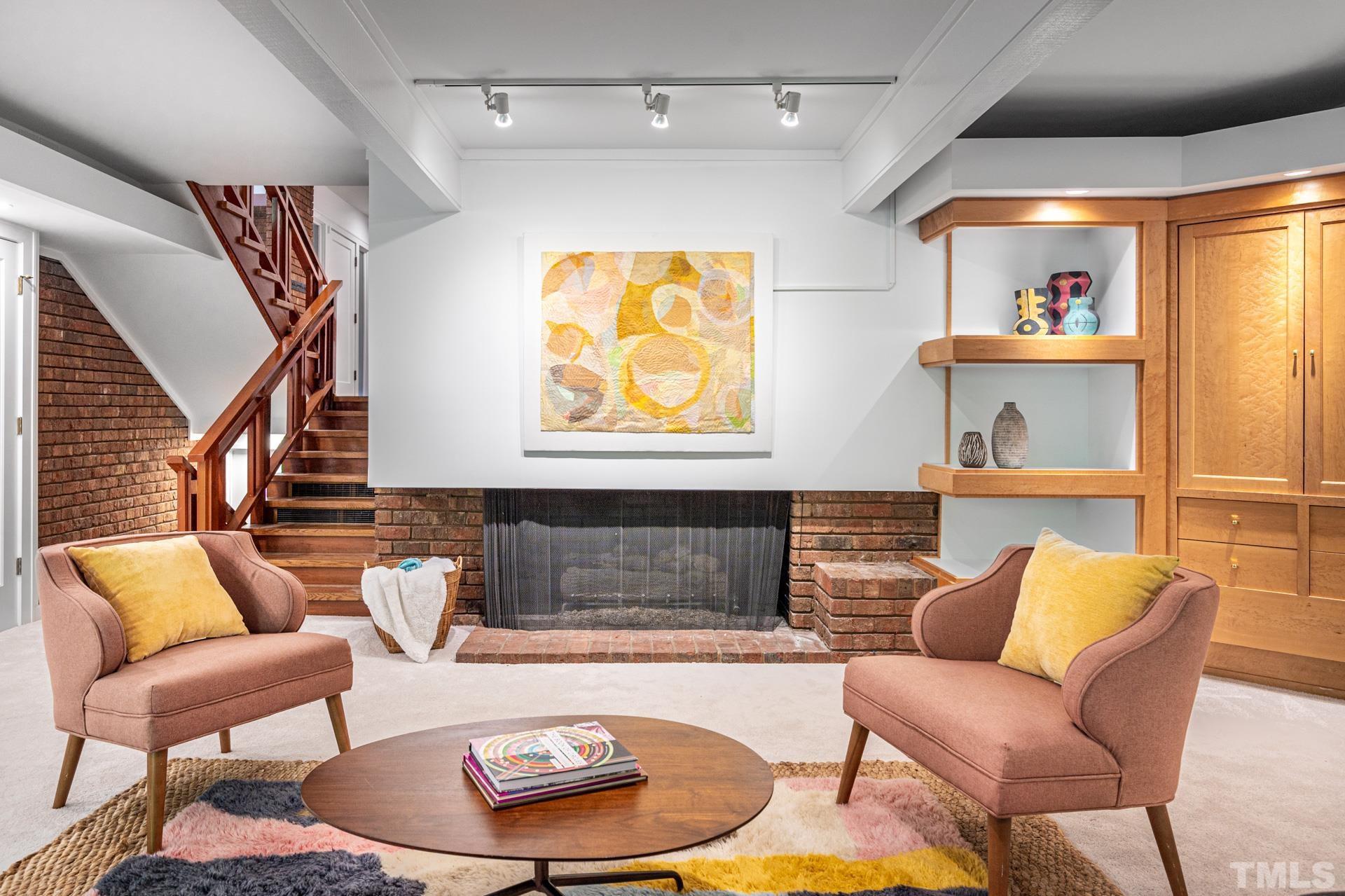 803 Cedar Falls Road Chapel Hill, NC 27514 - Photo 42 of 61 a living room with furniture and a wooden floor