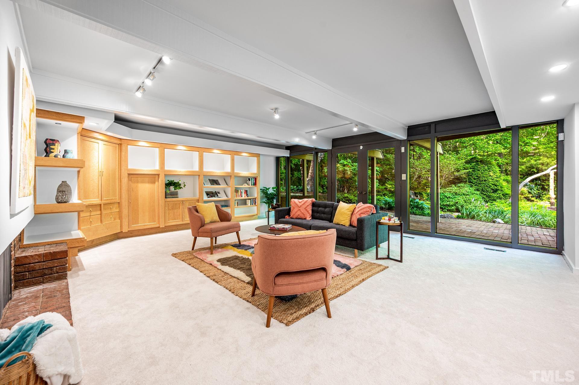 803 Cedar Falls Road Chapel Hill, NC 27514 - Photo 43 of 61 a living room with furniture and garden view