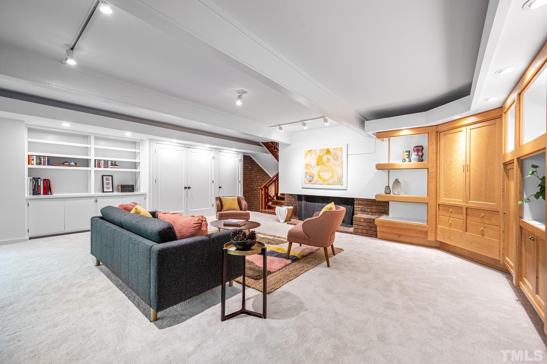 803 Cedar Falls Road Chapel Hill, NC 27514 - Photo 44 of 61 a living room with furniture and a large window