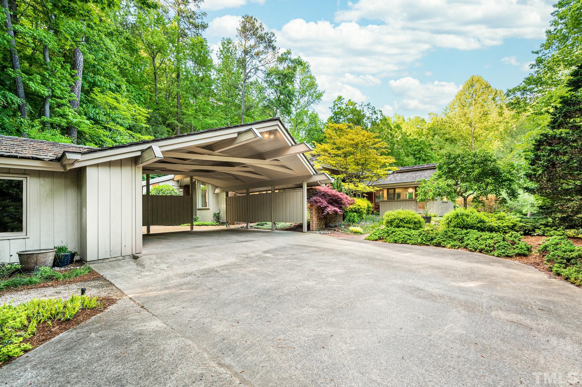 803 Cedar Falls Road Chapel Hill, NC 27514 - Photo 56 of 61 a view of a house with backyard and garden
